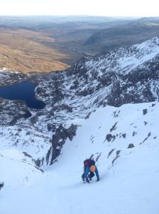 Kate enjoying the crisp neve climbing Col Gully, Cwm Lloer, Snowdonia